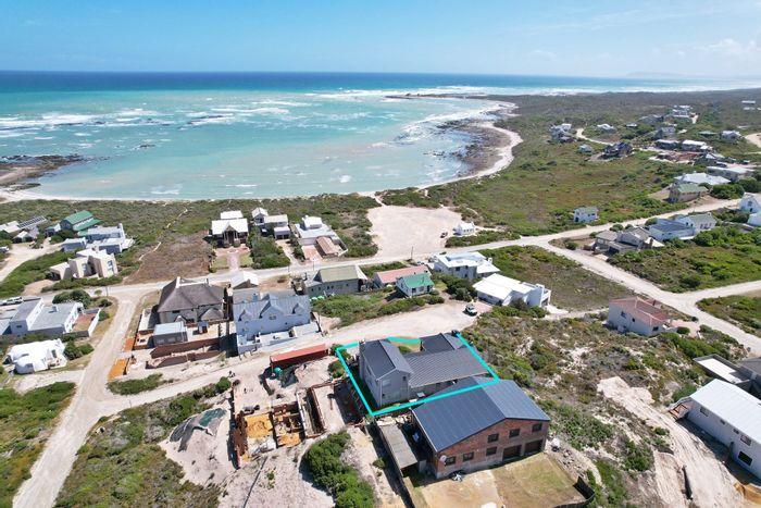 For Sale: Versatile 6-bedroom house in Suiderstrand Central with sea views and braais.