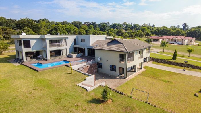 For Sale: House in White River AH with pool, gym, and spacious living areas.