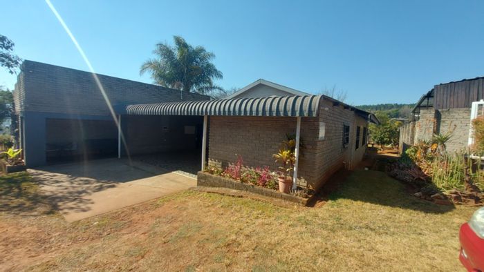 House for Sale in Sabie Central: 3 Bedrooms, flatlet, large garden, ample parking.
