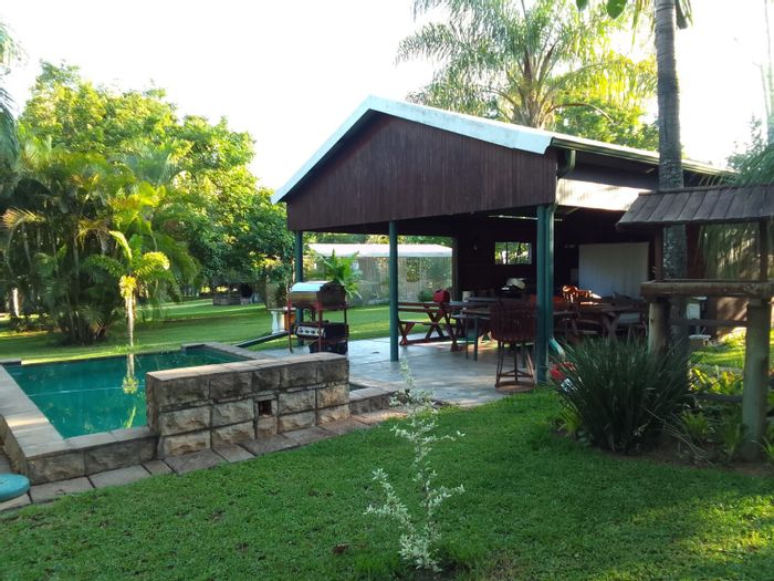 For Sale: White River AH Small Holding with salon, cabins, pool, and gardens.