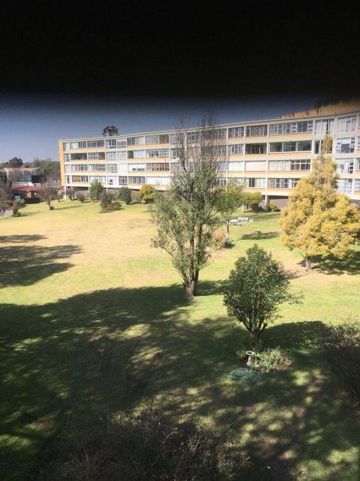 Illovo Apartment For Sale: Tenant In Place, Spacious with Garden Views & Amenities!