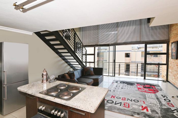 Exclusive Solheim Apartment For Sale: Loft unit with balcony, garage, pool, and gym.