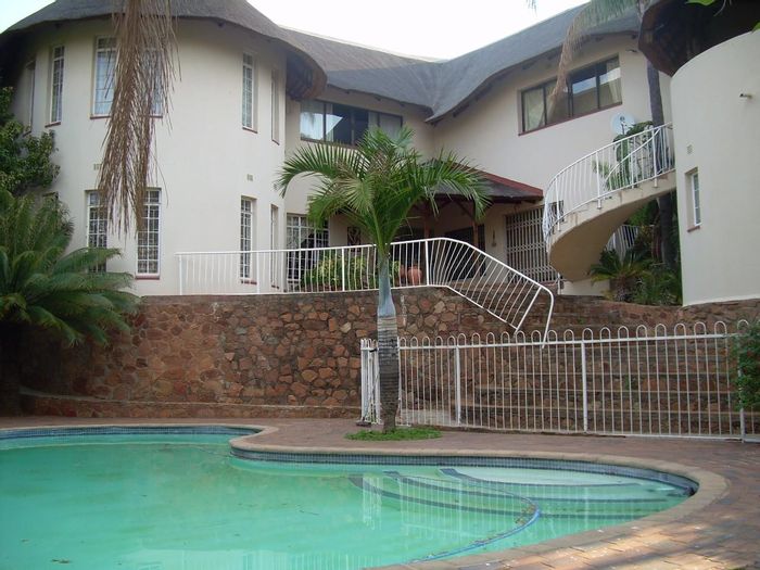 For Sale: 5-bedroom house in Protea Park with spacious living areas and guest house potential.
