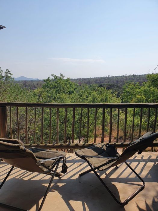 For Sale: House in Utopia Nature Estate with pools, tennis courts, and hiking trails.