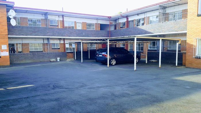 For Sale: Office in Rosettenville with 10 rental units and covered parking.