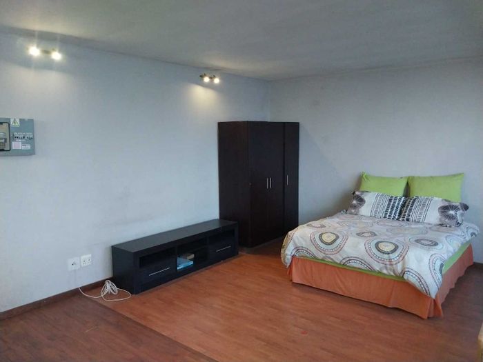 Bachelor apartment in Johannesburg Central for sale, top floor, near amenities.