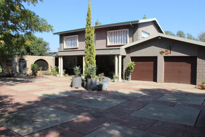 Farm for Sale in Miravaal: 4 Bedrooms, Boreholes, Garages, Business Potential.