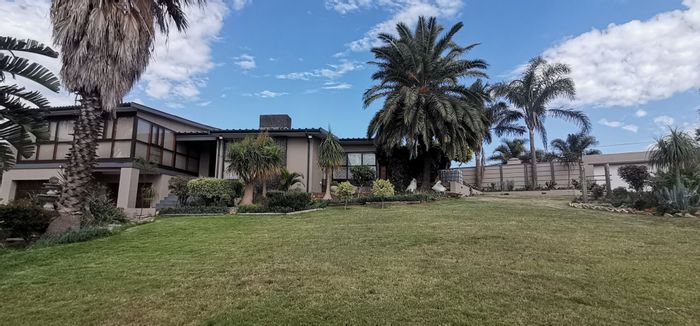 For Sale: Spacious 4-bedroom house in Bothasrus with pool, entertainment area, and garage.