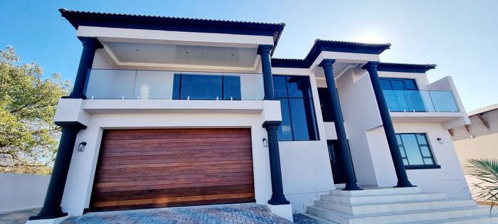 For Sale: House in Woodhill Estate with 4 bedrooms, study, and outdoor braai.