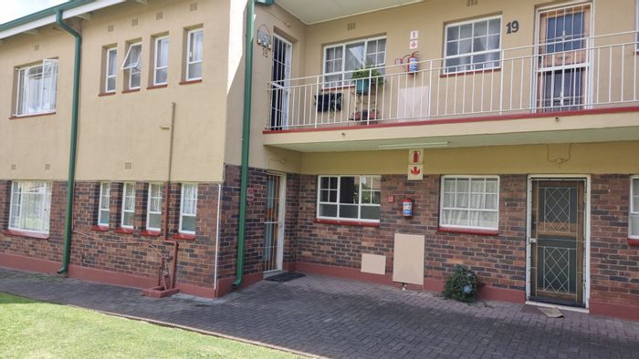 For Sale: 2-Bedroom Flat in Sasolburg Central with Balcony and Garage.