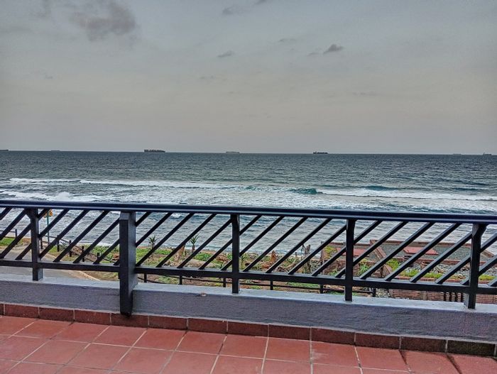 Beachfront flat for sale in Umdloti Beach with pool and secure parking.