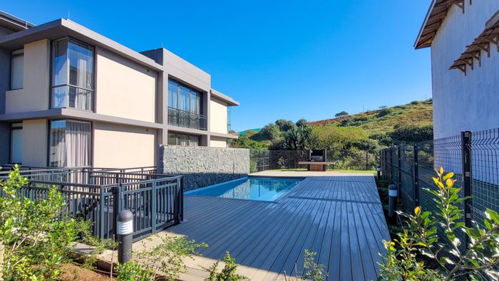For Sale: Flat in Port Zimbali with 2 bedrooms, 1 bathroom, and parking.