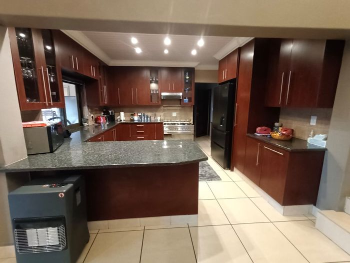 For Sale: Townhouse in Vanderbijlpark Central with pool, security, and entertainment area.