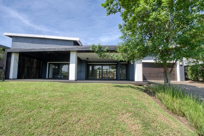 For Sale: House in Palm Lakes Estate with 4 bedrooms, 3 bathrooms, and dual garages.