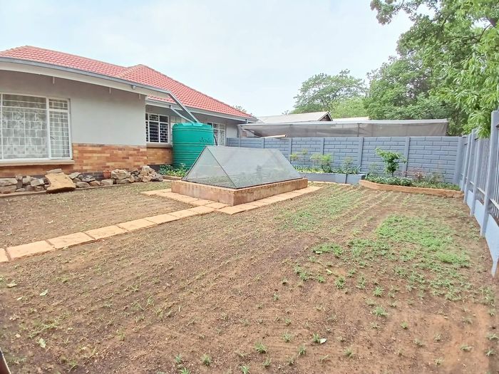 For Sale: House in Sasolburg Ext 4 with flatlet, garden, and outdoor braai.