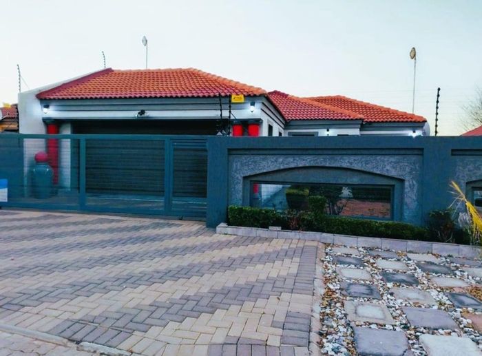 For Sale: House in Rethabile Gardens with 3 bedrooms, garden, and double garage.