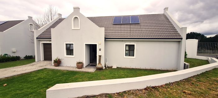For Sale: House in Zevenwacht Retirement Village with 2 beds, study, and amenities.