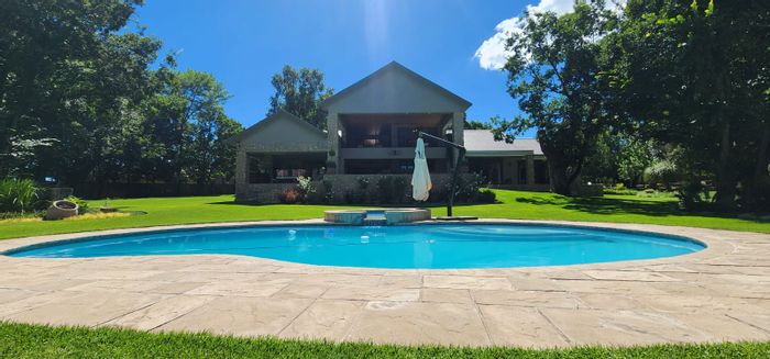 Marlbank Farm For Sale: Equestrian amenities, guest cottage, river access, and security.