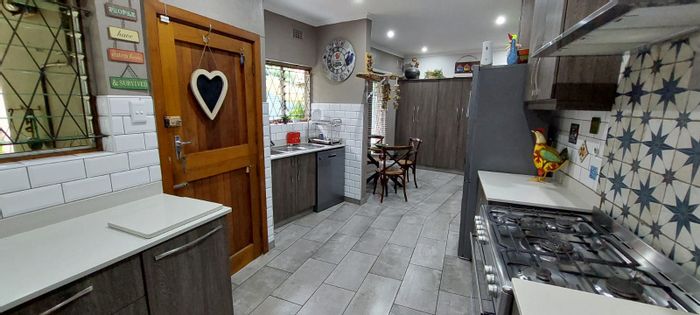 For Sale: Spacious Boughton house with pool, flat, garage, and development potential.