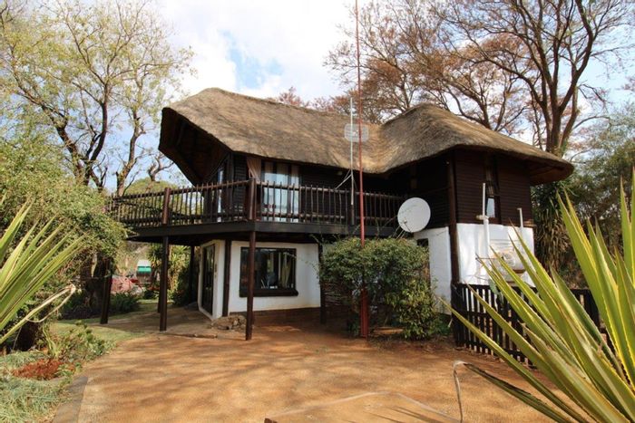 Farm for Sale in Bela Bela Rural: Main house, rental chalets, strong borehole.