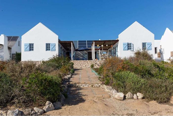 Church Haven House For Sale: 4 bedrooms, off-grid living, lagoon access, fireplace.