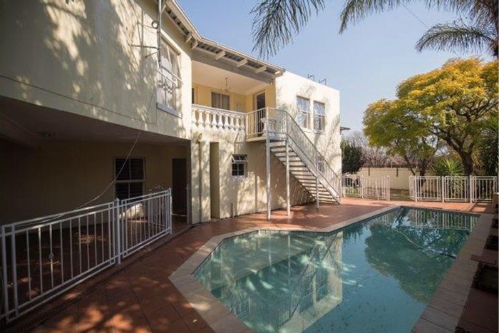 For Sale: Brooklyn House with 12 Bedrooms, Pool, and Guesthouse Potential.