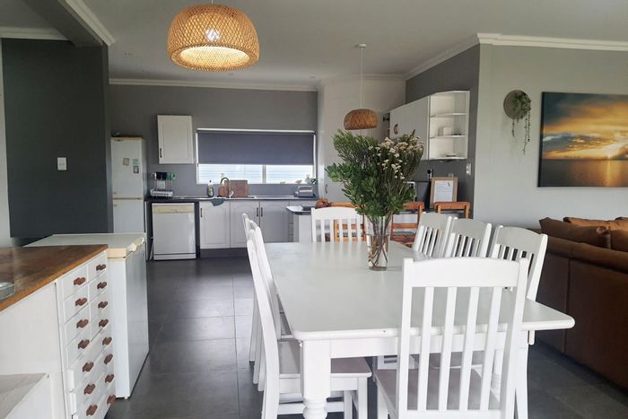 Boggomsbaai House For Sale: 5 bedrooms, beach access, rental income potential.