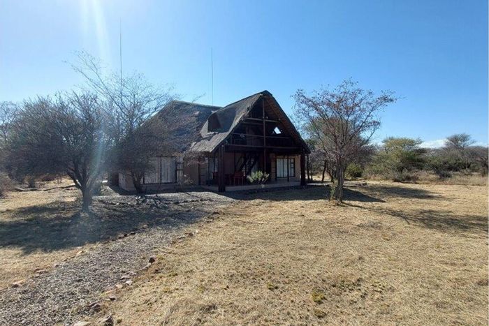 House for Sale in Bela Bela Rural: Wildlife estate, dual living, braai areas, game drive access.