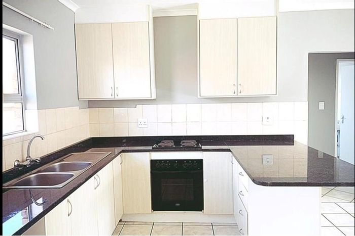 For Sale: 2-bedroom apartment in Birchleigh with balcony and covered parking.