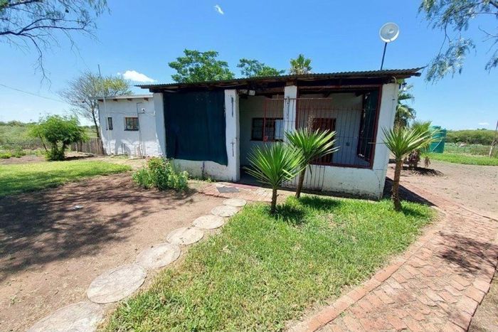 Radium Farm For Sale: 28.5 ha with livestock facilities, boreholes, and fenced camps.