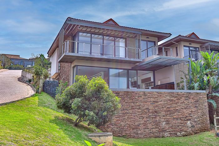 Zimbali Townhouse For Sale: 4 bedrooms, sea views, pool, and entertainment areas.