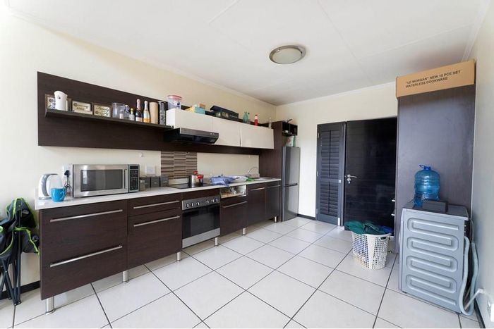 For Sale: Douglasdale Apartment with pool, gym, balcony, and pet-friendly policy.