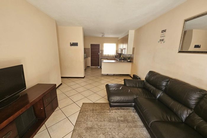 For Sale: Monavoni Townhouse with 3 bedrooms, balcony, garage, and open parking.