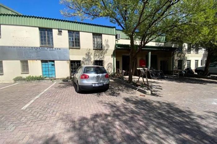 Industrial property for sale in Halfway House with ample space and loading docks.