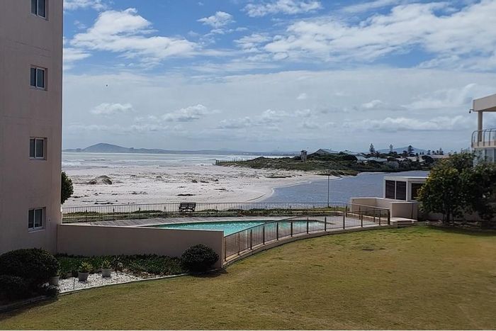Lagoon Beach Apartment For Sale: Ocean views, spacious veranda, secure access, fully furnished.