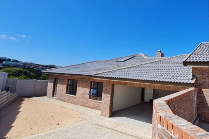 For Sale: House in Dana Bay with 3 bedrooms, garden, and built-in braai.