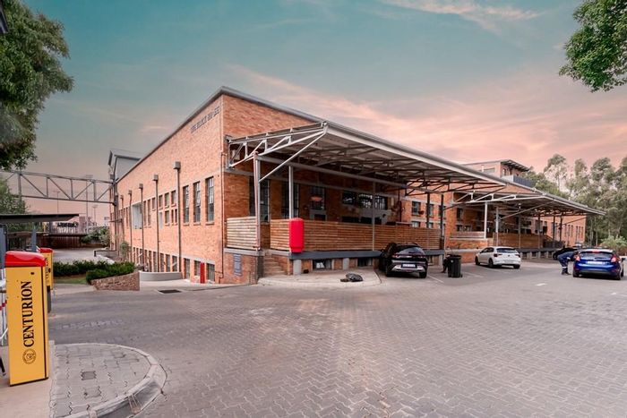 For Sale: Unique Braamfontein Werf Apartment with greenbelt, 24-hour security, and parking.