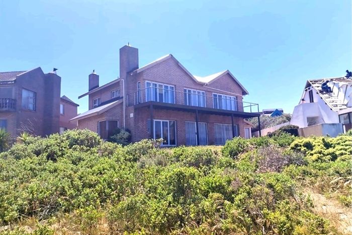 5-Bedroom House for Sale in Bluewater Bay with flatlet, braai room, and ocean views.