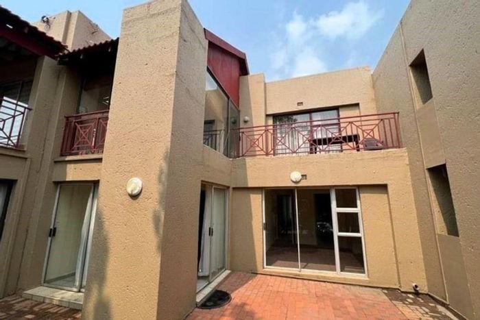 Townhouse For Sale in Abrahamsrust: 2 bedrooms, pool access, and built-in braai.