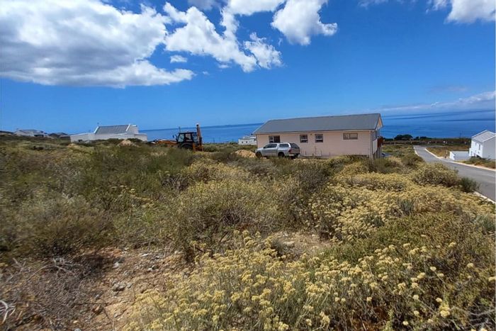 Elevated vacant land in St Helena Views with ocean views and low levies. For Sale.