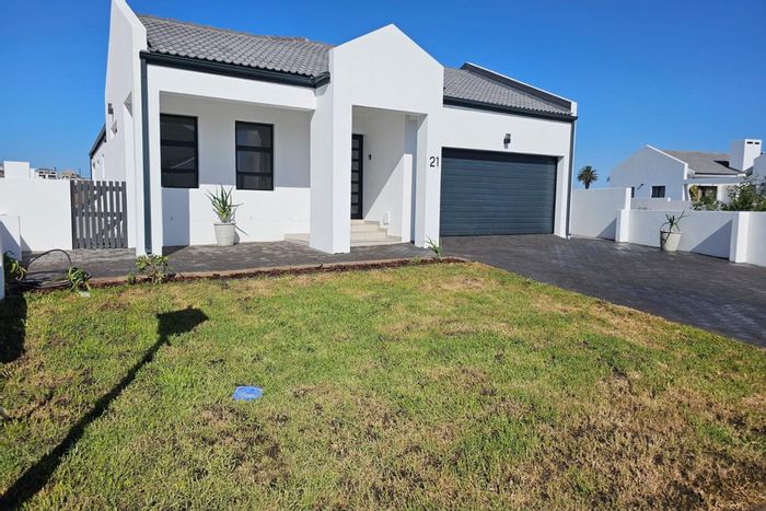 Golf course views, beach access, open-plan living, and under-cover patio in Shelley Point. For Sale.