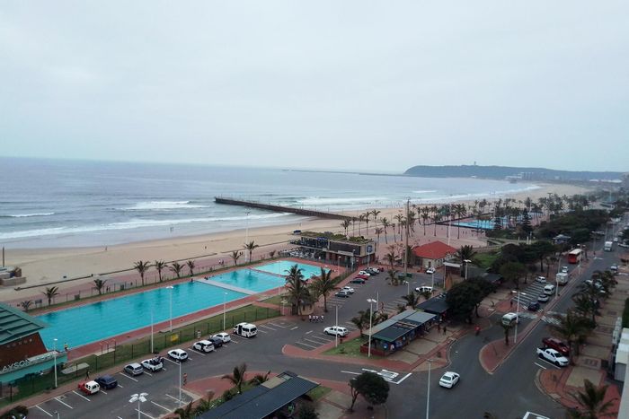 North Beach Apartment For Sale: Beachfront, 2 beds, sea views, near amenities.