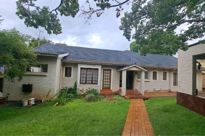 For Sale: Parkmore House with 4 en-suite bedrooms, income potential, and ample parking.