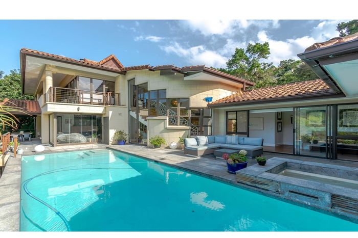 Zimbali House For Sale: Five bedrooms, lake views, pool deck, natural forest setting.