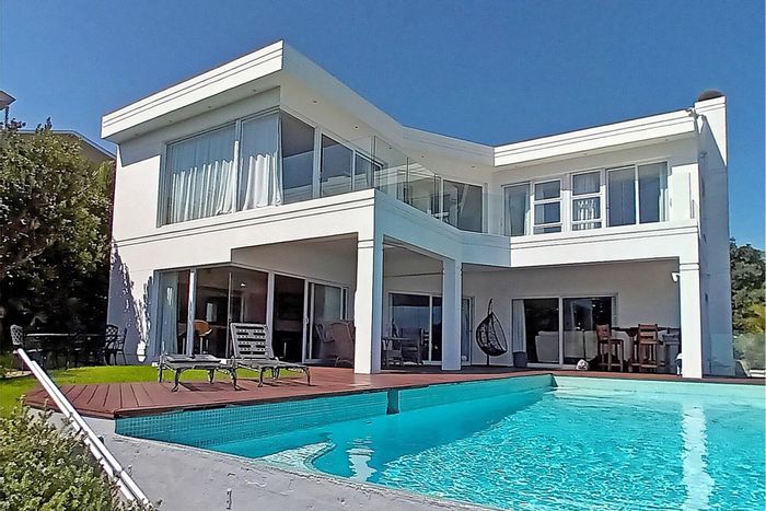 For Sale: Spacious Blue Bend house with 9 bedrooms, infinity pool, and dual dwellings.
