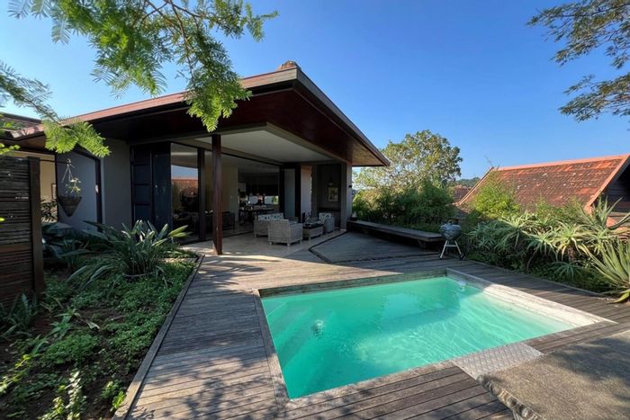 Zimbali Townhouse For Sale: Double garage, private garden, pool, three en-suites.