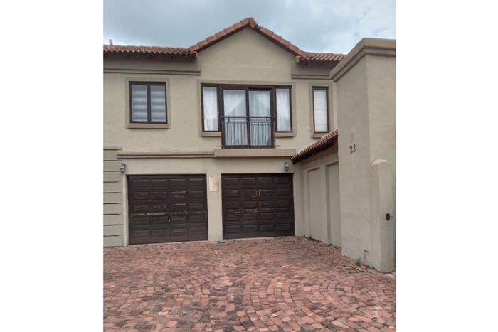 3-bedroom apartment in Theresapark with double garage, garden, and braai area. To Rent.