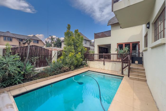 For Sale: Douglasdale House with 4 beds, pool, security, and garage.
