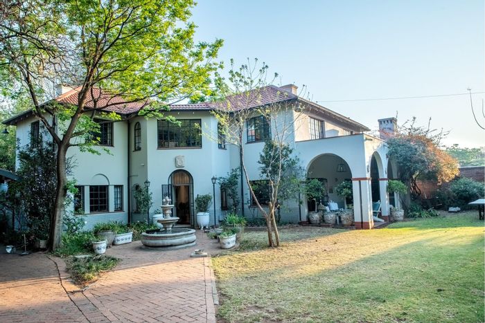 Saxonwold House For Sale: Four en-suite bedrooms, designer kitchen, and guest cottages.