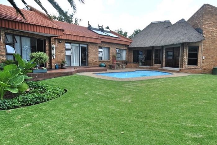 Vaalpark House For Sale: 4 bedrooms, flatlet, heated pool, solar energy, entertainment areas.